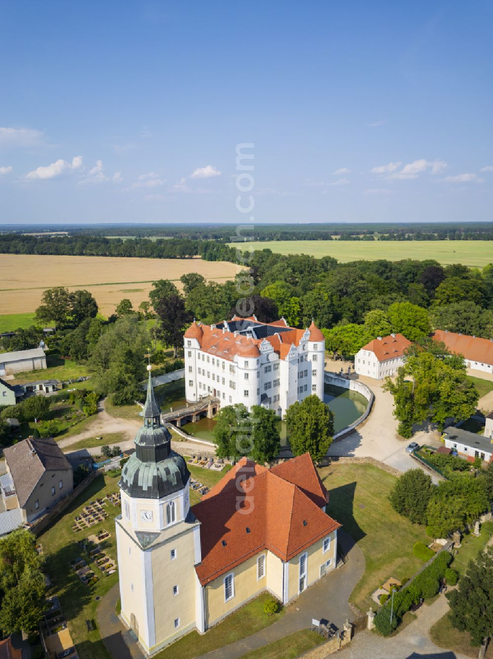 Großkmehlen from above - Buildings and castle park - moated castle and St. George's Church in Grosskmehlen in the federal state of Brandenburg, Germany