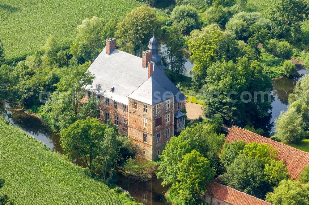 Aerial image Welver - Building and castle park systems of water castle Haus Nehlen in Welver in the state North Rhine-Westphalia