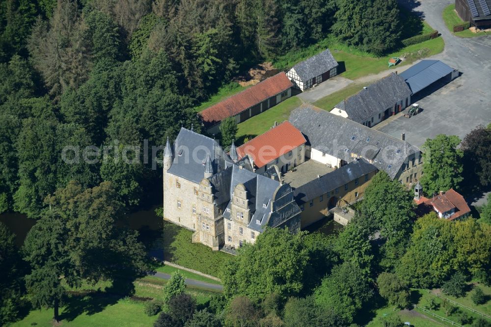 Aerial photograph Schledehausen - Building and castle park systems of water castle Schelenburg in Schledehausen in the state Lower Saxony