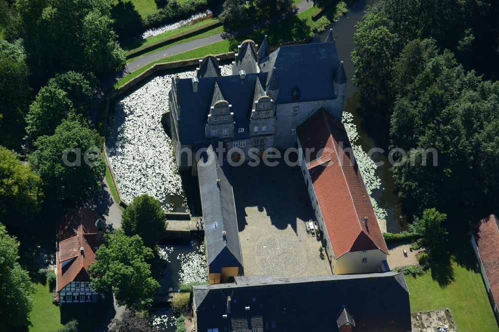 Schledehausen from above - Building and castle park systems of water castle Schelenburg in Schledehausen in the state Lower Saxony