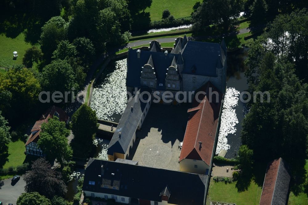 Schledehausen from above - Building and castle park systems of water castle Schelenburg in Schledehausen in the state Lower Saxony