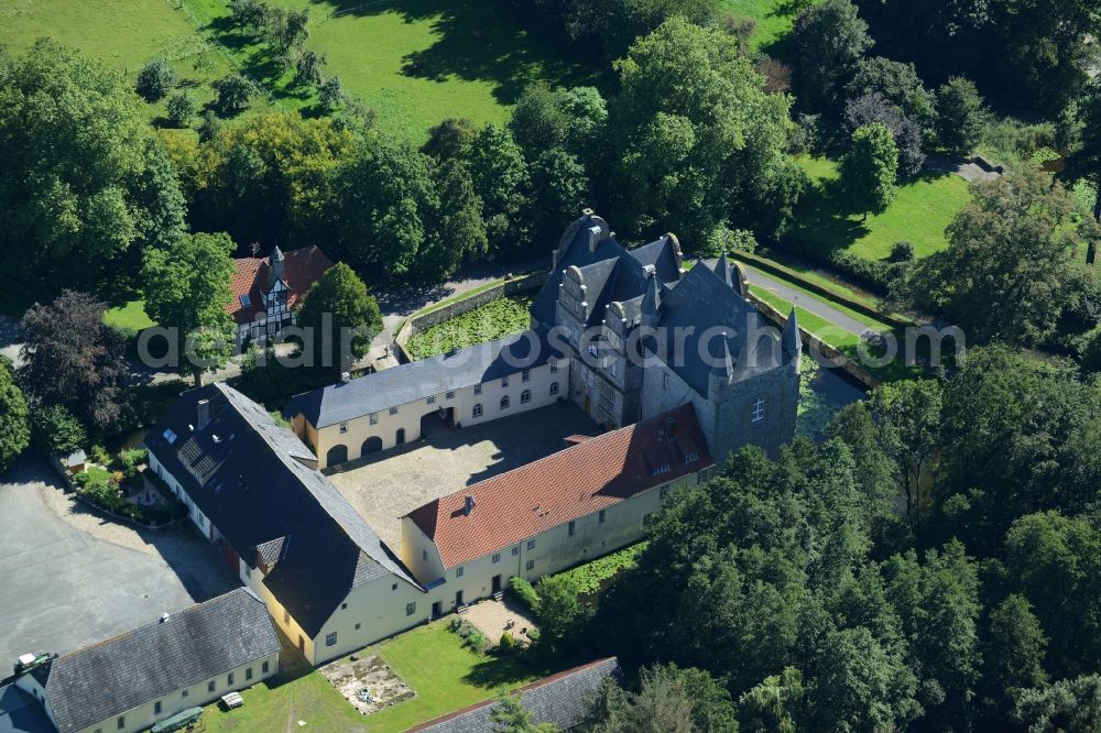 Aerial image Schledehausen - Building and castle park systems of water castle Schelenburg in Schledehausen in the state Lower Saxony