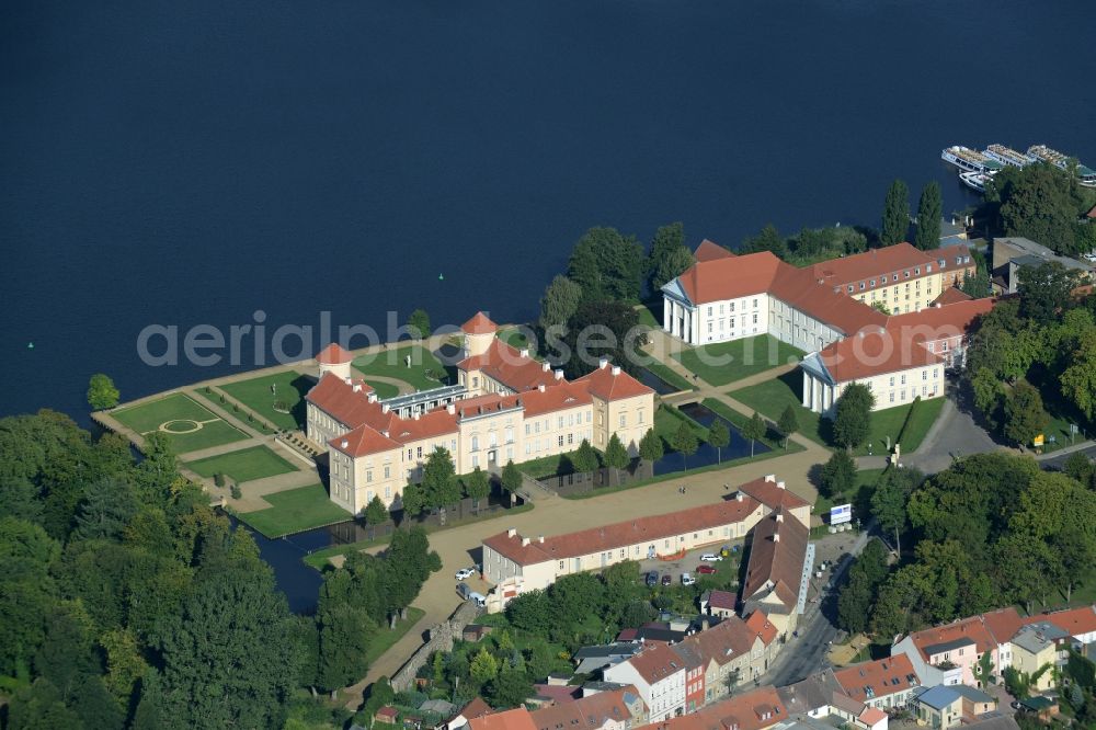 Rheinsberg from above - Building and castle park systems of water castle Schloss Rheinsberg and the following building of the conservatoire Musikakademie Rheinsberg GmbH Kavalierhaus in Rheinsberg in the state Brandenburg