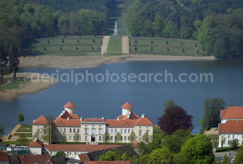 Rheinsberg from the bird's eye view: Building and castle park systems of water castle Rheinsberg in Rheinsberg in the state Brandenburg