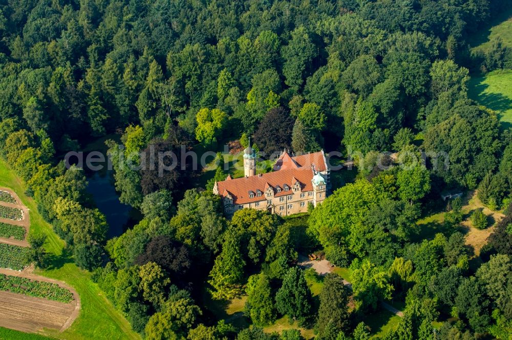 Löhne from above - Building and castle park systems of water castle Ulenburg in Loehne in the state North Rhine-Westphalia. The former castle is now the Wittekindshof - deaconal institution for mentally handicapped persons