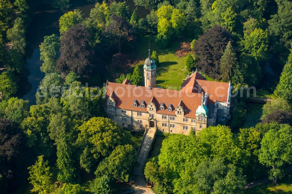 Löhne from above - Building and castle park systems of water castle Ulenburg in Loehne in the state North Rhine-Westphalia. The former castle is now the Wittekindshof - deaconal institution for mentally handicapped persons