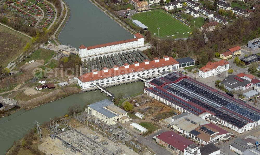 Töging am Inn from above - Building and dams of the waterworks and hydroelectric power plant in Toeging am Innkanal in the state of Bavaria, Germany