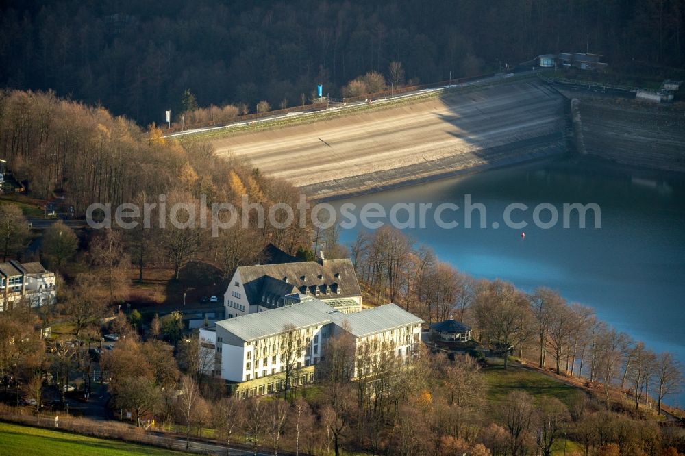 Aerial image Meschede - Low water level and lack of water caused the shoreline areas to be exposed of Hennesee in Meschede in the state North Rhine-Westphalia, Germany