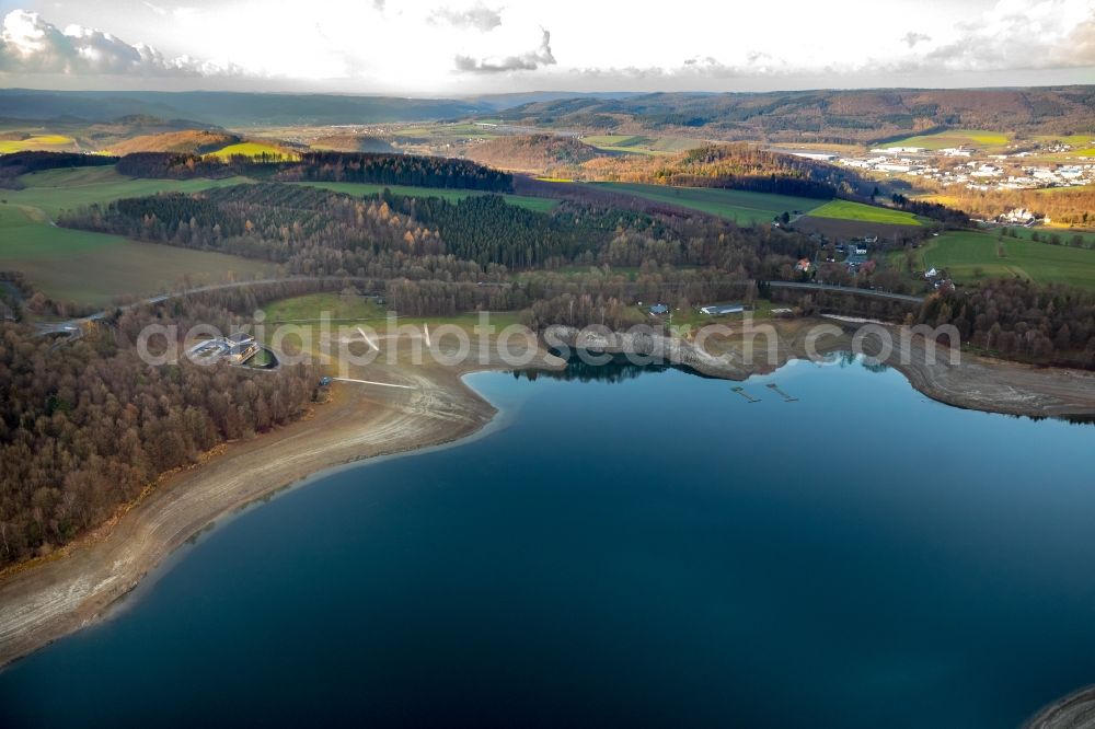 Meschede from above - Low water level and lack of water caused the shoreline areas to be exposed of Hennesee in Meschede in the state North Rhine-Westphalia, Germany