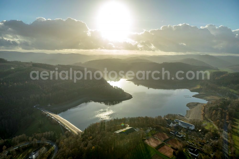 Aerial image Meschede - Low water level and lack of water caused the shoreline areas to be exposed of lake Hennesee in Meschede in the state North Rhine-Westphalia, Germany