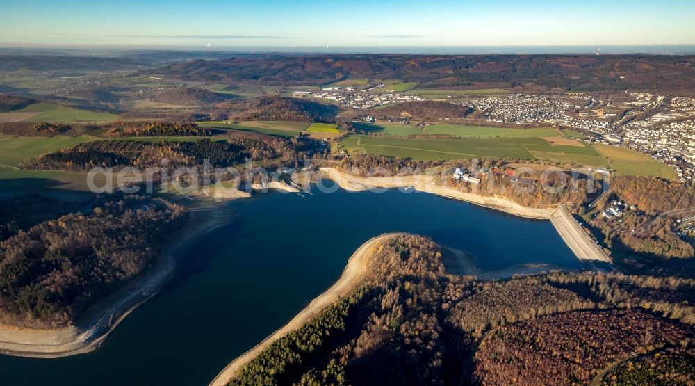 Meschede from above - Low water level and lack of water caused the shoreline areas to be exposed of Hennesee in the district Enkhausen in Meschede in the state North Rhine-Westphalia, Germany