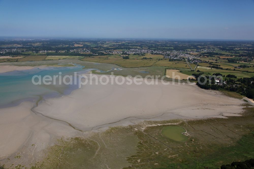 Aerial photograph Lancieux - Water surface and at low tide exposed seabed at the bay along the sea coast in Lancieux in Brittany, France