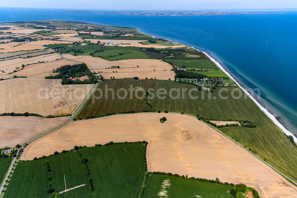 Kronsgaard from the bird's eye view: Water surface at the seaside and the field landscape on Seeblick in Kronsgaard in the state Schleswig-Holstein, Germany