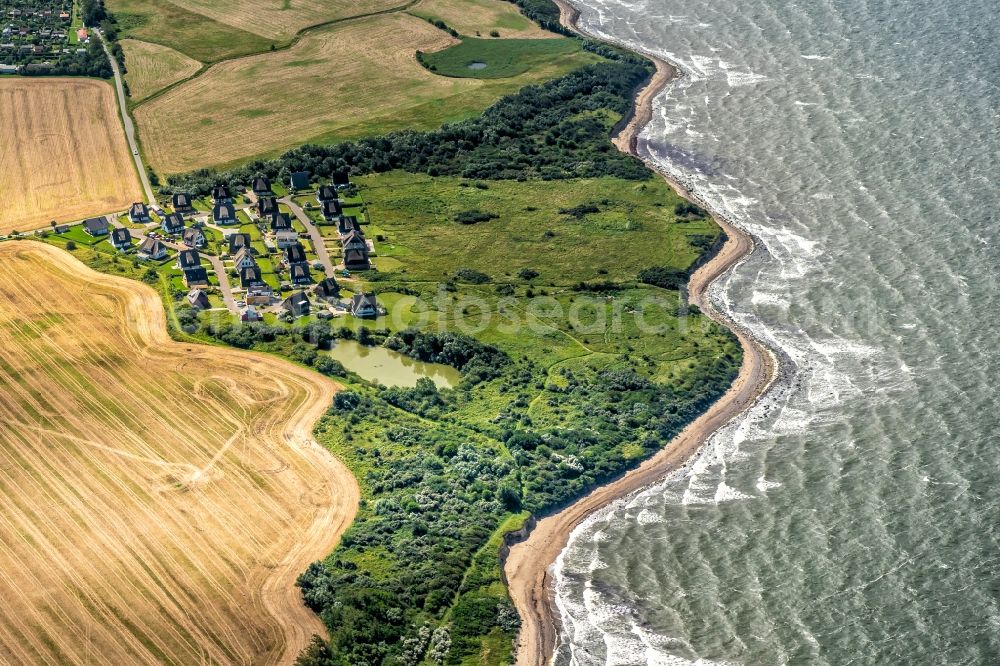 Dranske from the bird's eye view: Water surface at the seaside with Feriensiedlung in Dranske in the state Mecklenburg - Western Pomerania, Germany