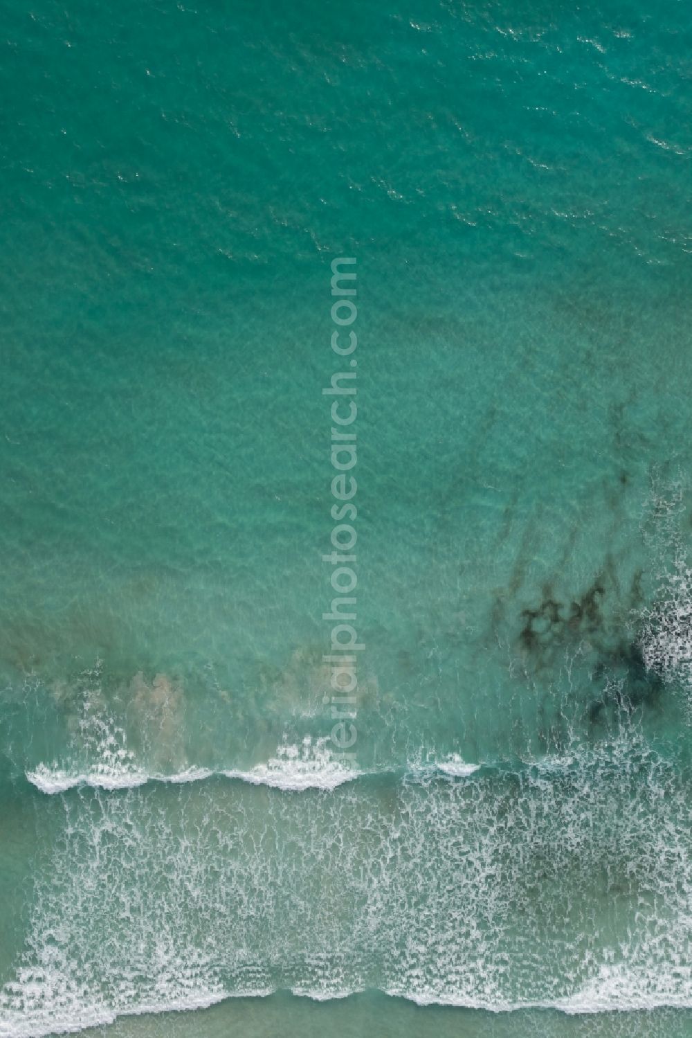 Aerial image Llucmajor - Water surface at the seaside of mediteran sea in Llucmajor in Balearic Islands, Spain