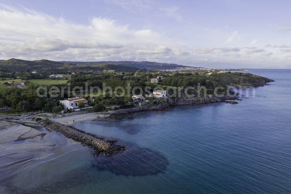 Aerial image Perd'e Sali - Water surface at the seaside of the Tyrrhenian Sea in the Mediterranean Sea in Perd'e Sali in Sardegna - Sardinia, Italy