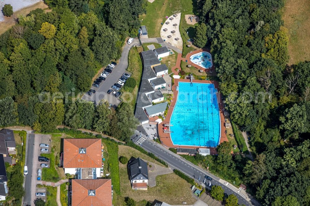 Aerial image Fröndenberg/Ruhr - Waterslide on Swimming pool of the Freibad Loehnbad Im Wiesengrund in Froendenberg/Ruhr in the state North Rhine-Westphalia, Germany