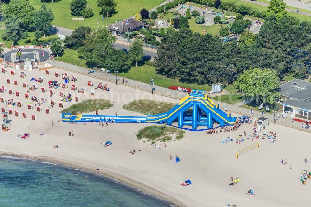 Grömitz from the bird's eye view: Water slide on the beach of the Baltic Sea in Groemitz in the state of Schleswig-Holstein