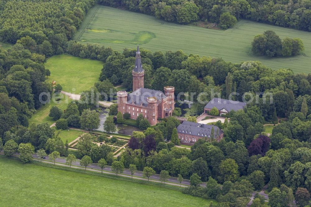 Bedburg-Hau from above - 06/02/2012 Bedburg-Hau View of the water tower Moyland in the state of North Rhine-Westphalia. The neo-Gothic monument is home to a museum's extensive collection of modern art of the brothers van der Grinten and is a popular destination on the Lower Rhine