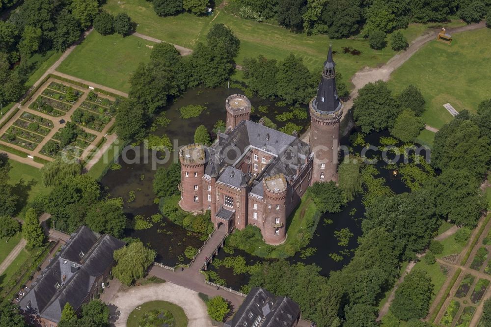 Bedburg-Hau from above - 06/02/2012 Bedburg-Hau View of the water tower Moyland in the state of North Rhine-Westphalia. The neo-Gothic monument is home to a museum's extensive collection of modern art of the brothers van der Grinten and is a popular destination on the Lower Rhine