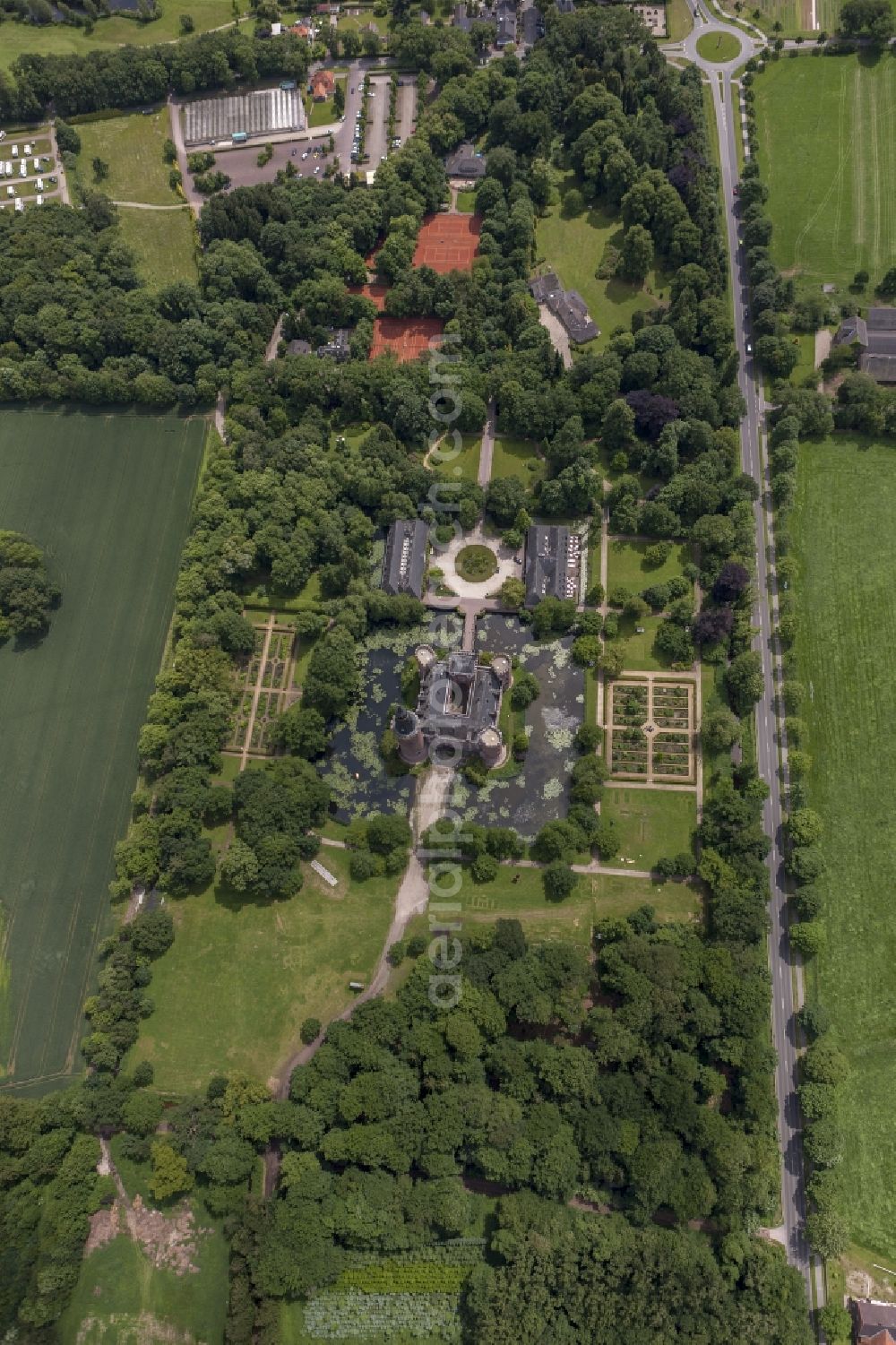 Bedburg-Hau from above - 06/09/2012 Bedburg-Hau View of the water tower Moyland in the state of North Rhine-Westphalia. The neo-Gothic monument is home to a museum's extensive collection of modern art of the brothers van der Grinten and is a popular destination on the Lower Rhine