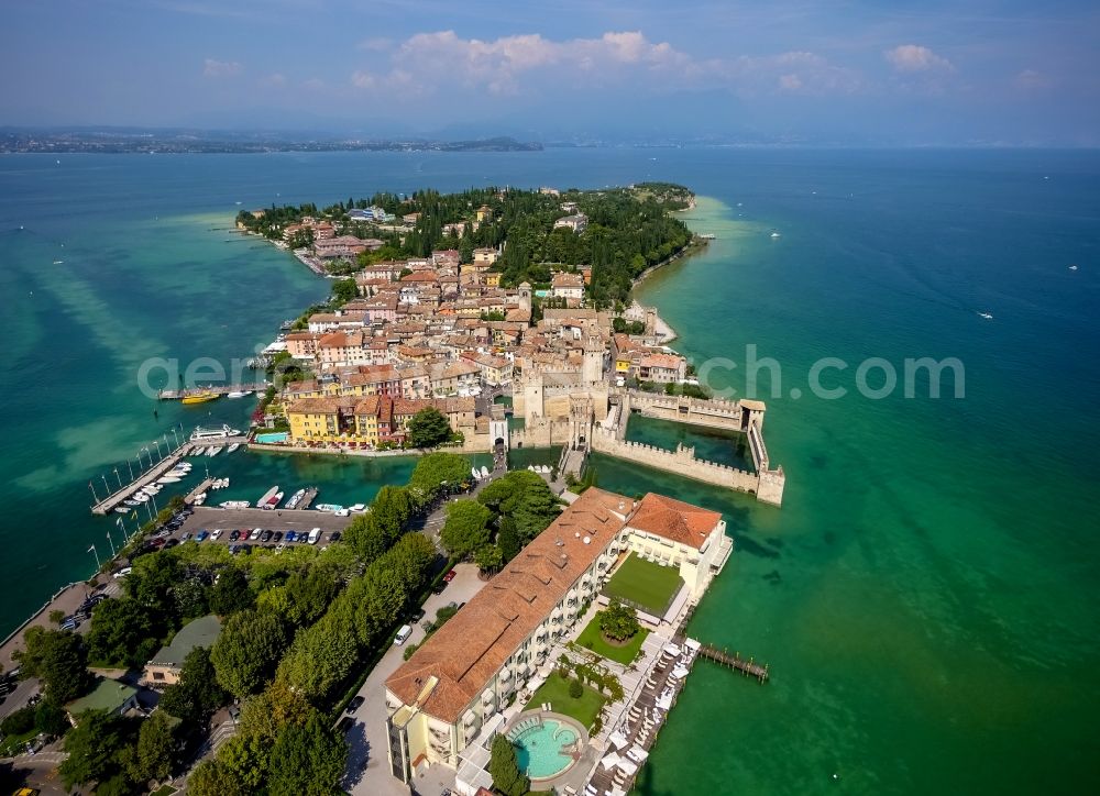 Sirmione from the bird's eye view: Building of water castle Scaligerburg - Castello Scaligero on the headland Sirmione in Lombardia, Italy