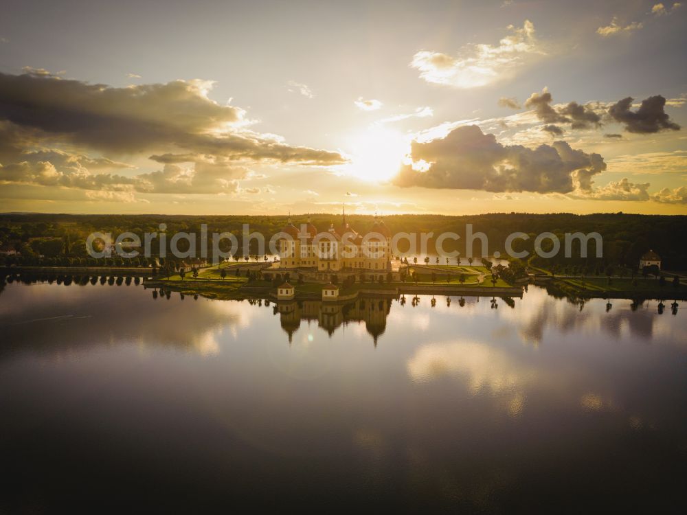 Aerial photograph Moritzburg - Sunset over the hunting and moated castle in the castle pond in Moritzburg in the federal state of Saxony, Germany