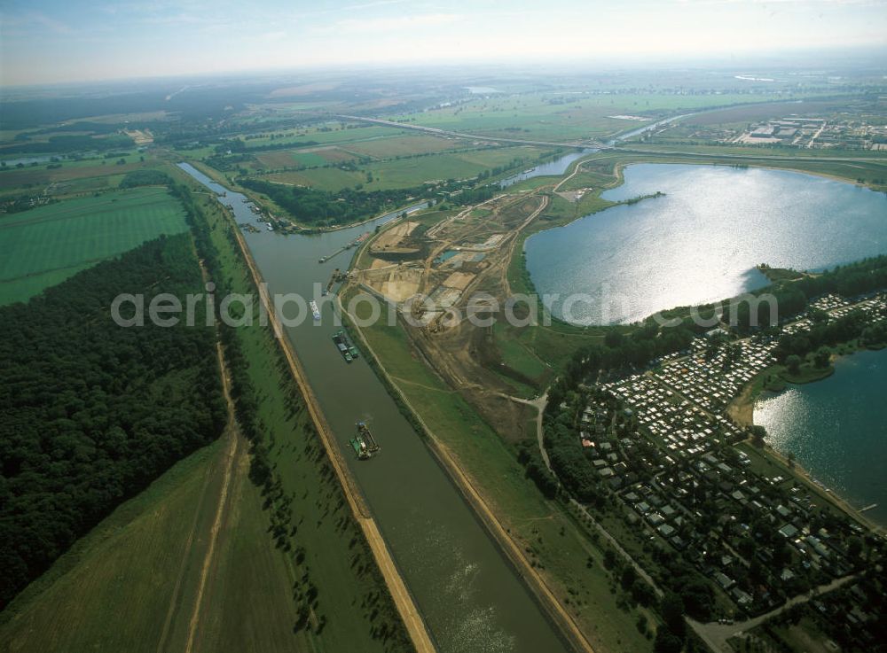 Aerial image Magdeburg - Blick auf das Wasserstraßenkreuz Magdeburg im Bau neben dem Barleber See I und II. Im Vordergrund das Schiffshebewerk Rothensee. Im Hintergrund die Kanalbrücke Magdeburg (Eröffnung Oktober 2003). Sie verbindet den Elbe-Havel-Kanal mit dem Mittellandkanal über die Elbe hinweg.