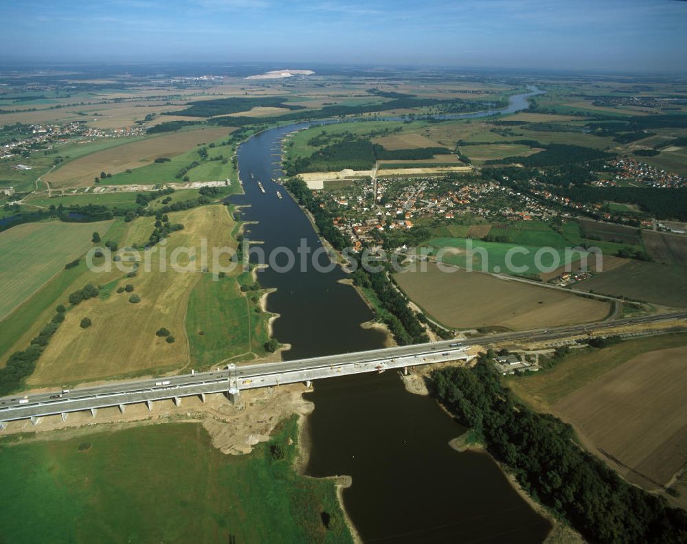 Magdeburg from above - Blick auf das Wasserstraßenkreuz Magdeburg mit der im Bau befindlichen Kanalbrücke / Trogbrücke im Hintergrund. Im Vordergrund die Autobahnbrücke der E30 über die Elbe.