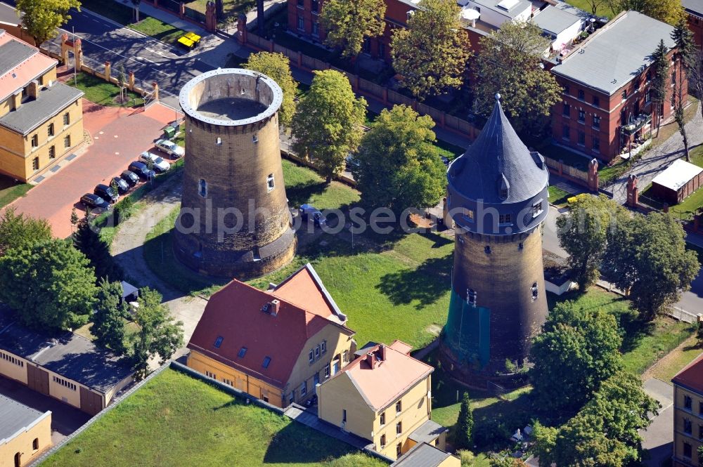 Aerial photograph Leipzig - Blick auf die Wassertürme Leipzig-Möckern im Bundesland Sachsen. Die nicht mehr im Betrieb stehenden Türme an der Olbrichtstraße wurden 1897 und 1903 gebaut. Sie gehören der Kommunalen Wasserwerke Leipzig GmbH und stehen unter Denkmalschutz.