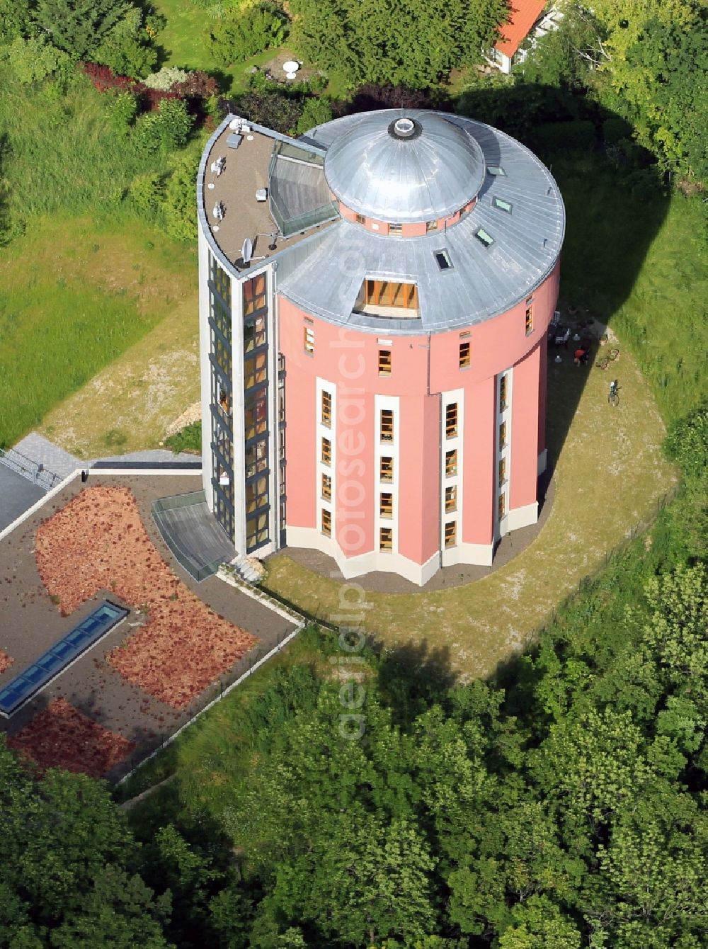 Aerial image Arnstadt - The listed water tower building near the mountain Arnsberg in Arnstadt in the state of Thuringia. The water tower was rebuilt by the ProWohn Immobilien GmbH into a residential house