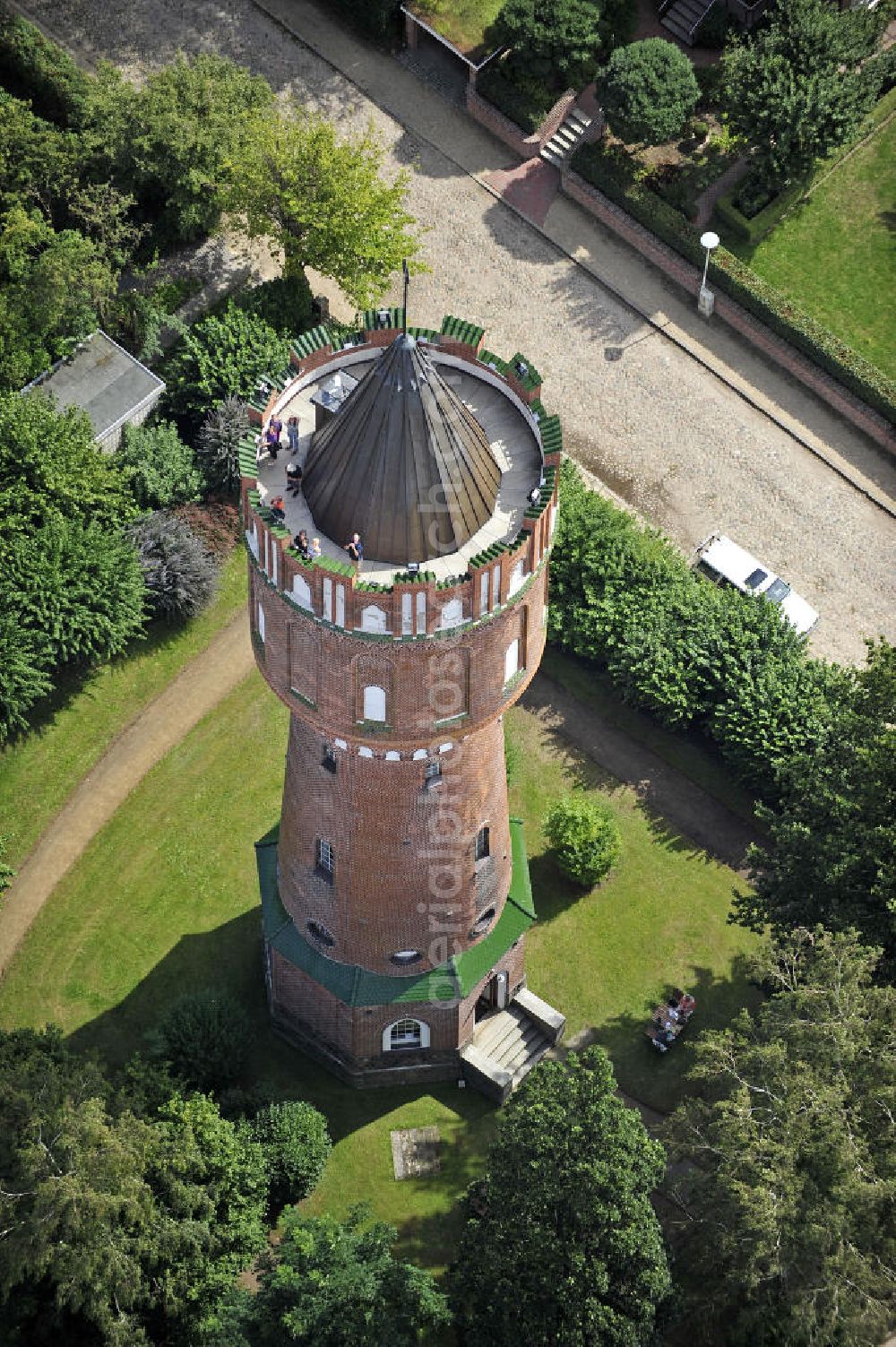 Eutin from the bird's eye view: Blick auf den Wasserturm Eutin. Der 38 m hohe Backsteinturm wurde 1909 errichtet. Im Sommer wird er als Aussichtsturm genutzt und im Turm finden regelmäßig Ausstellungen zeitgenössischer Kunst statt. View of the water tower Eutin. The 38-meter-high brick tower was built in 1909. In summer it is used as an observation tower and is regular used for exhibitions of contemporary art.