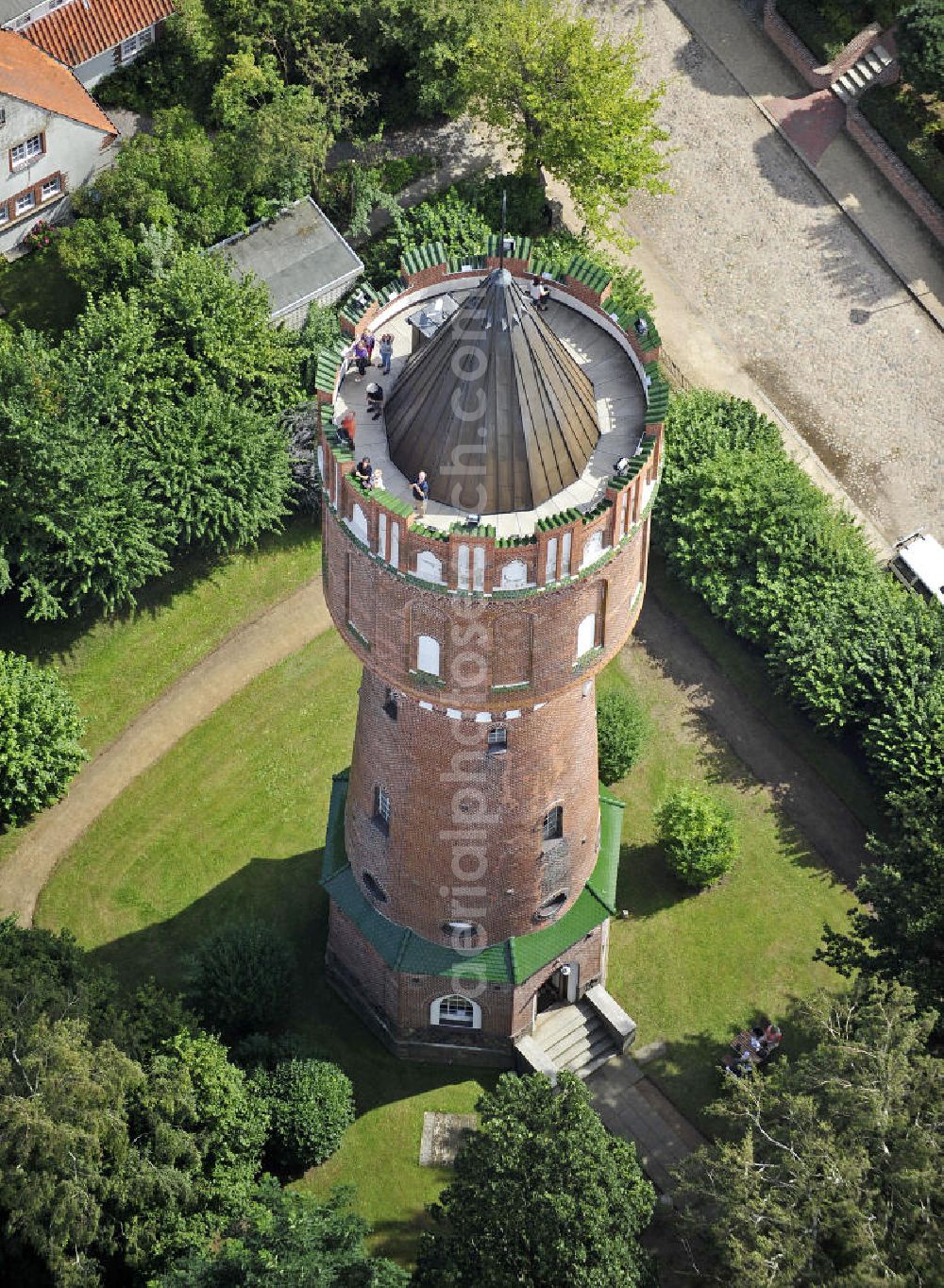 Aerial image Eutin - Blick auf den Wasserturm Eutin. Der 38 m hohe Backsteinturm wurde 1909 errichtet. Im Sommer wird er als Aussichtsturm genutzt und im Turm finden regelmäßig Ausstellungen zeitgenössischer Kunst statt. View of the water tower Eutin. The 38-meter-high brick tower was built in 1909. In summer it is used as an observation tower and is regular used for exhibitions of contemporary art.