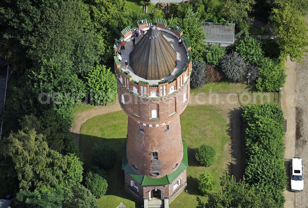 Aerial photograph Eutin - Blick auf den Wasserturm Eutin. Der 38 m hohe Backsteinturm wurde 1909 errichtet. Im Sommer wird er als Aussichtsturm genutzt und im Turm finden regelmäßig Ausstellungen zeitgenössischer Kunst statt. View of the water tower Eutin. The 38-meter-high brick tower was built in 1909. In summer it is used as an observation tower and is regular used for exhibitions of contemporary art.