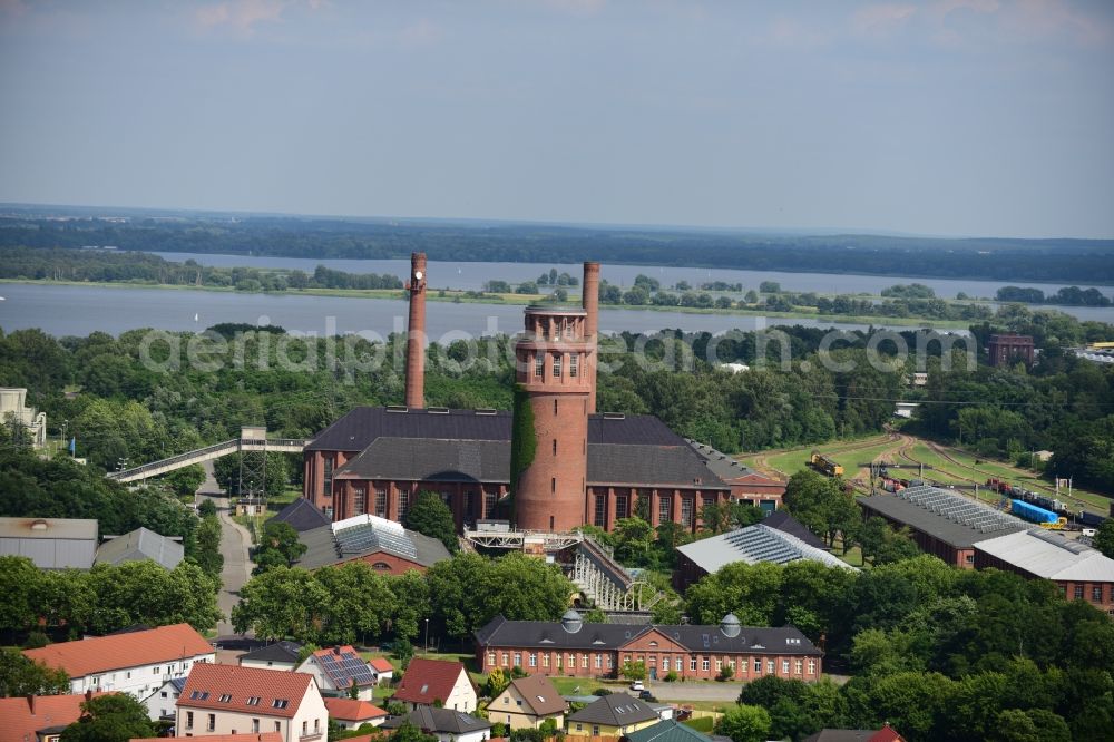 Aerial image Kirchmöser - View of the landmark of Kirchmoeser, the water tower. This building is a protected monument and is today used by the forestry industry as a guard and coordination point