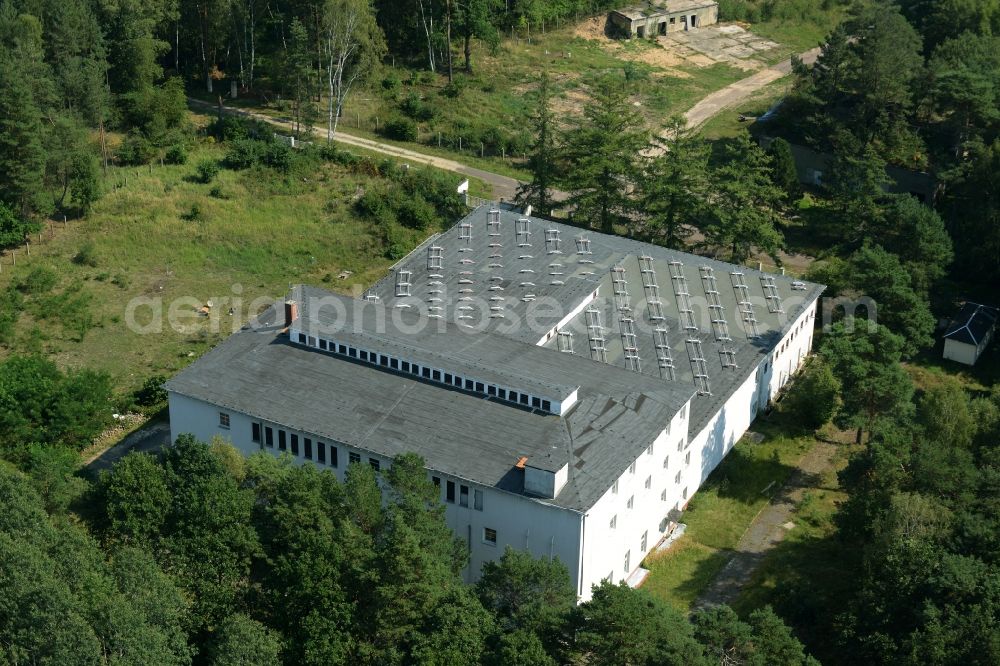 Aerial photograph Kossa - Waterworks in Kossa in the state of Saxony. The building with the flat roof and solar cells is located in a forest on B-Weg in the North of the area of Kossa