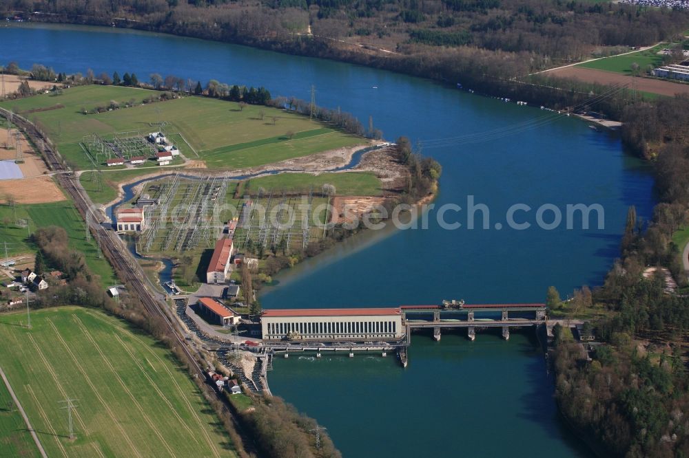 Möhlin from above - Structure and dams of the waterworks and hydroelectric power plant - Kraftwerk Ryburg-Schwoerstadt on Kraftwerkstrasse in Moehlin in the canton Aargau, Switzerland