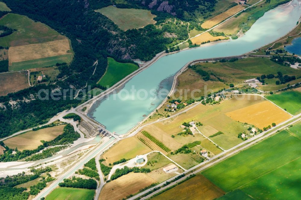 Méreuil from above - Structure and dams of the waterworks and hydroelectric power plant on whitewater river Buech in Mereuil in Provence-Alpes-Cote d'Azur, France