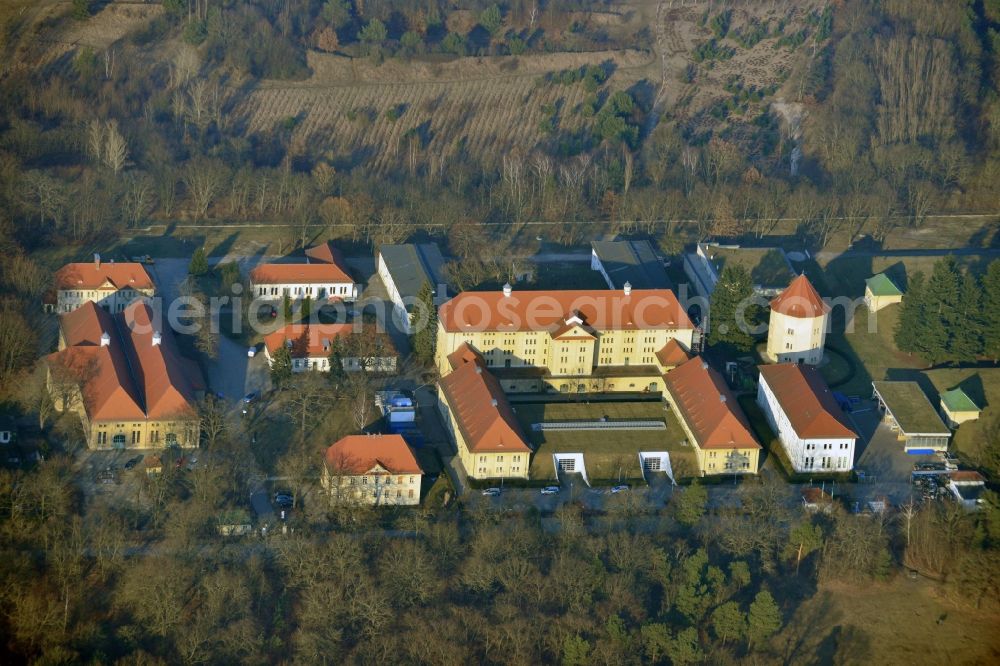 Aerial image Berlin - Waterworks Wuhlheide in the Oberschoeneweide part of the district of Treptow-Koepenick in Berlin. The historic compound stems from 1914 and supplies water from the forest area of Wuhlheide to ca. 130000 inhabitants of Berlin. It is surrounded by forest and consists of several buildings and outbuildings