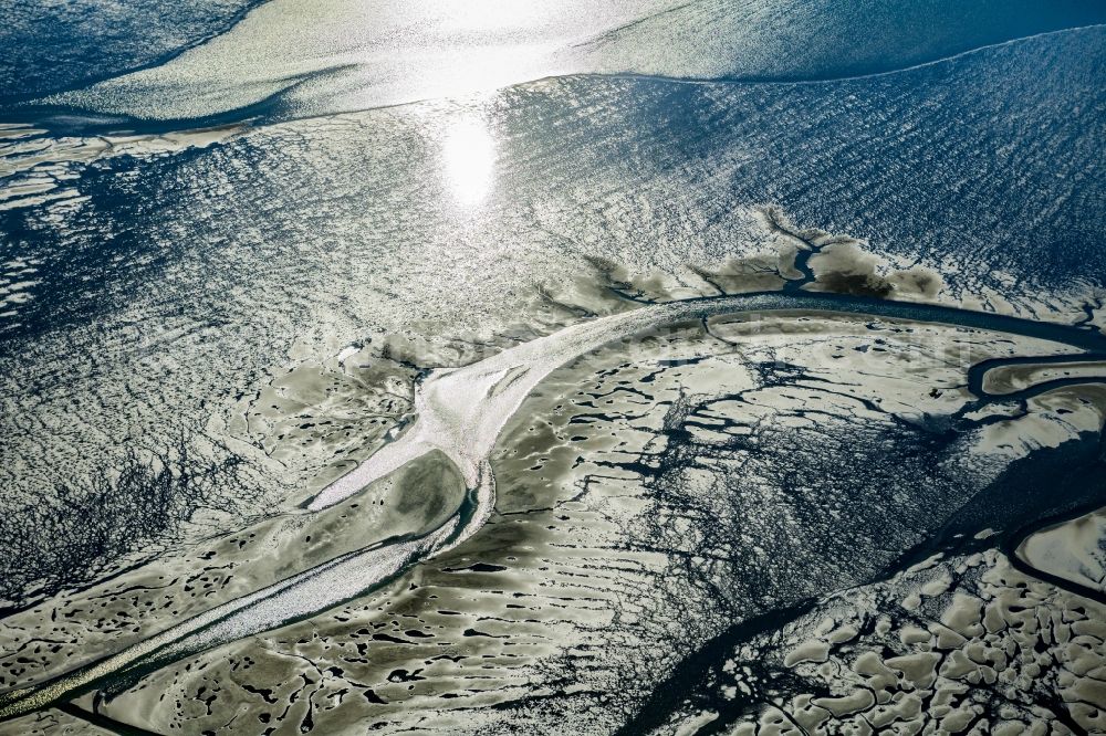 Friedrichskoog from the bird's eye view: Wadden Sea of North Sea Coast in Sonnenuntergang in Friedrichskoog in the state Schleswig-Holstein, Germany