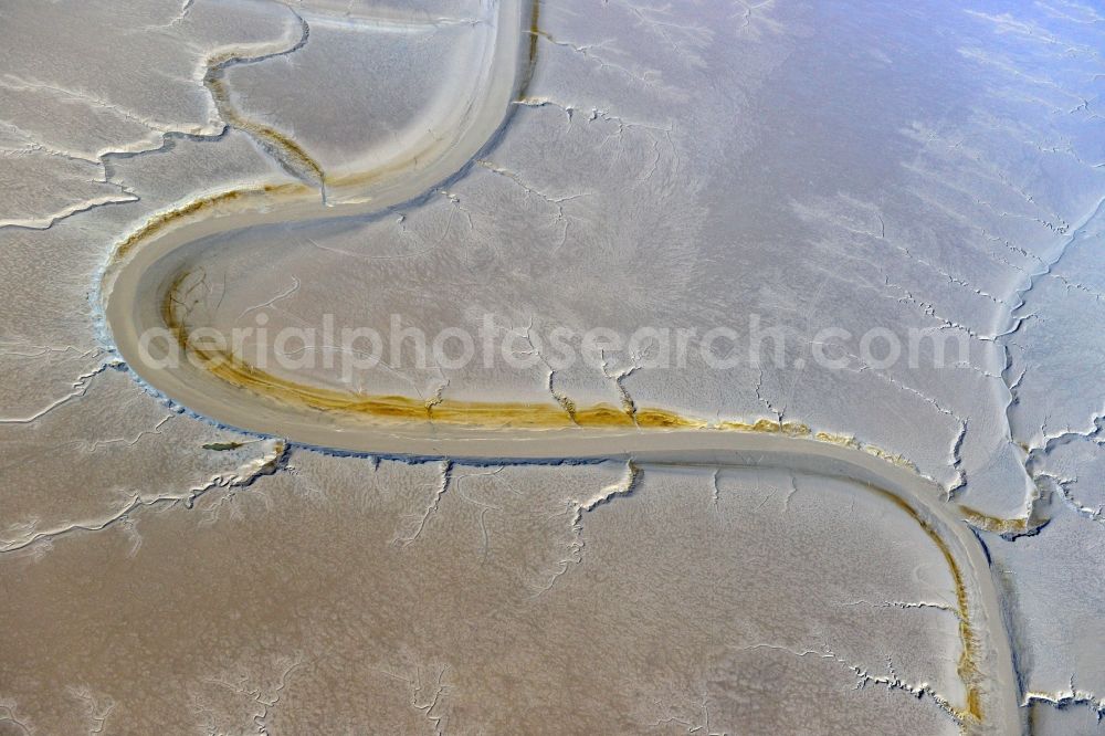 Dangast from the bird's eye view: Wadden Sea with the low-water bed of the extension of the Jade Bay Dangaster low on the North Sea coast in the state of Lower Saxony Dangast