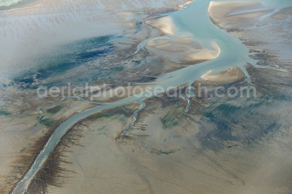 Ameland from the bird's eye view: Mudflats off the West Frisian Island of Ameland in the North Sea coast in the Netherlands