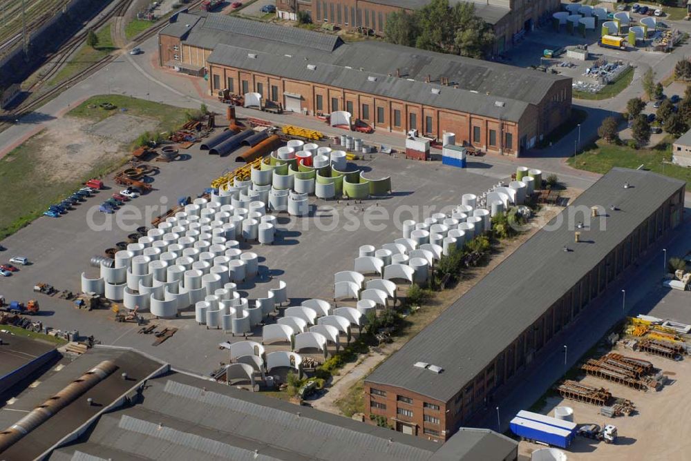 Aerial photograph Magdeburg - Blick auf die WEC Turmbau GmbH - sie ist eine Tochter der Enercon GmbH und zuständig für die Herstellung der Betontürme für Windkraftanlagen. WEC Turmbau GmbH Alt, Salbke 6-10, 39122 Magdeburg, Sachsen-Anhalt. Tel: 0391/407247-0 - Fax: 0391/4072471.