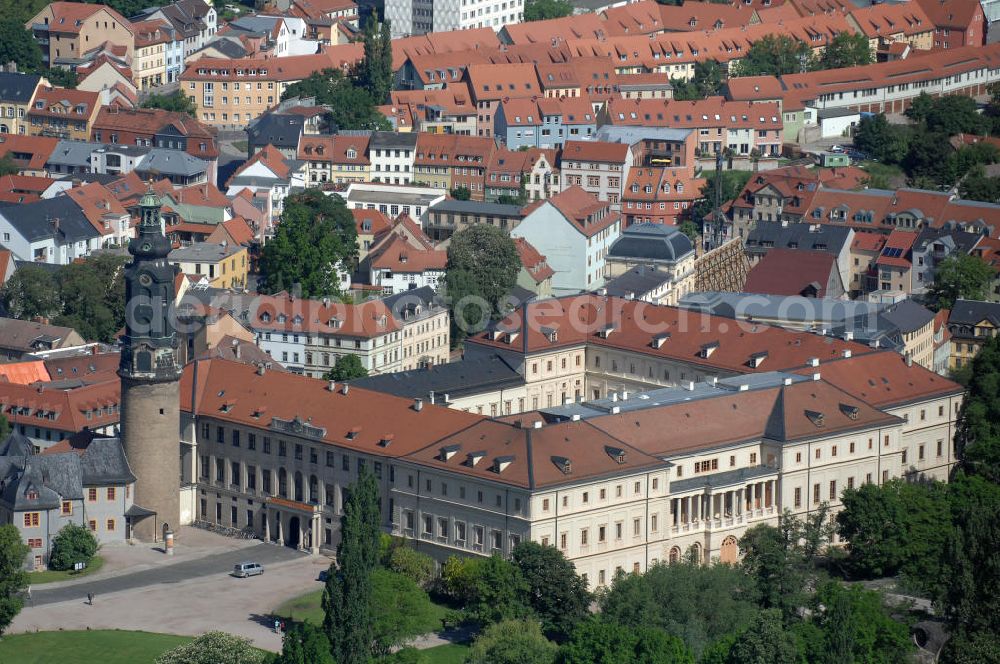 Aerial photograph WEIMAR - Blick auf das Weimarer Stadtschloss (auch Residenzschloss genannt). Das Schloss ist Teil des UNESCO-Weltkulturerbes „ Klassisches Weimar “ und seit Ende 2008 im Eigentum der Klassik Stiftung Weimar, mit Ausnahme des Gebäudeensembles der Bastille, das der Stiftung Thüringer Schlösser und Gärten gehört. View of the Weimar City Palace . The castle is a UNESCO World Heritage Site Classical Weimar since the end of 2008 and the property of the Weimar Classics Foundation.