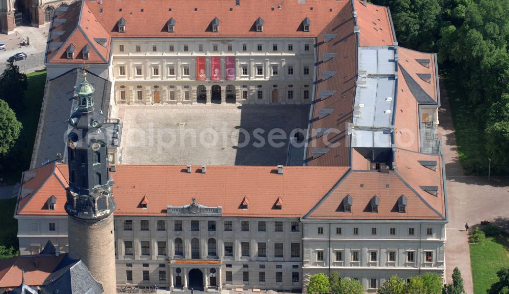 Aerial photograph WEIMAR - Blick auf das Weimarer Stadtschloss (auch Residenzschloss genannt). Das Schloss ist Teil des UNESCO-Weltkulturerbes „ Klassisches Weimar “ und seit Ende 2008 im Eigentum der Klassik Stiftung Weimar, mit Ausnahme des Gebäudeensembles der Bastille, das der Stiftung Thüringer Schlösser und Gärten gehört. View of the Weimar City Palace . The castle is a UNESCO World Heritage Site Classical Weimar since the end of 2008 and the property of the Weimar Classics Foundation.