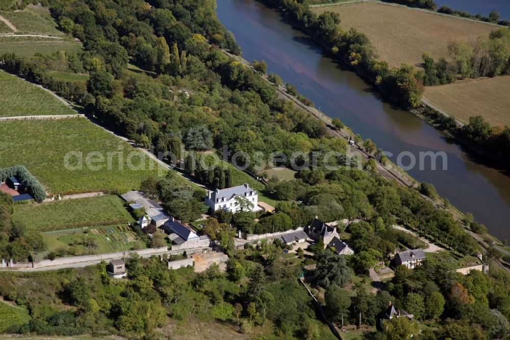 Aerial image Savennieres - Fields of wine cultivation landscape in Savennieres in Pays de la Loire, France. In the center of the image the Chateau de la Roche aux Moines de Coulee de Serrant