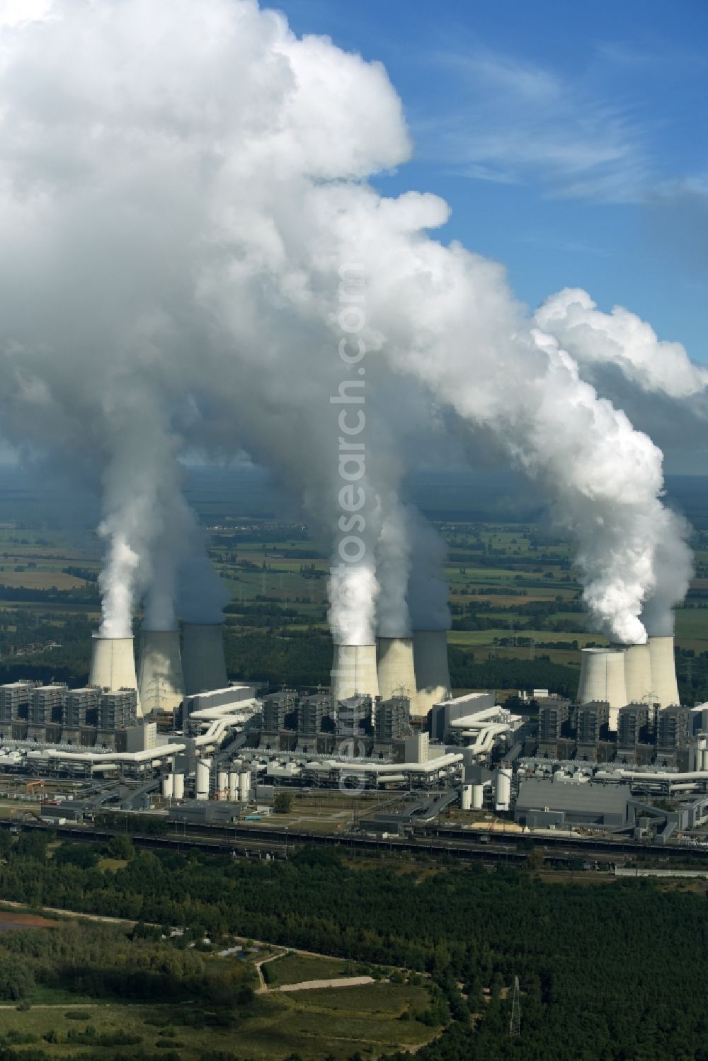 Aerial photograph Jänschwalde - Clouds of exhaust gas in the cooling towers of the power plant Jaenschwalde, a lignite-fired thermal power plant in southeastern Brandenburg. Power plant operator is to Vattenfall Europe belonging Vattenfall Europe Generation AG, which emerged from VEAG