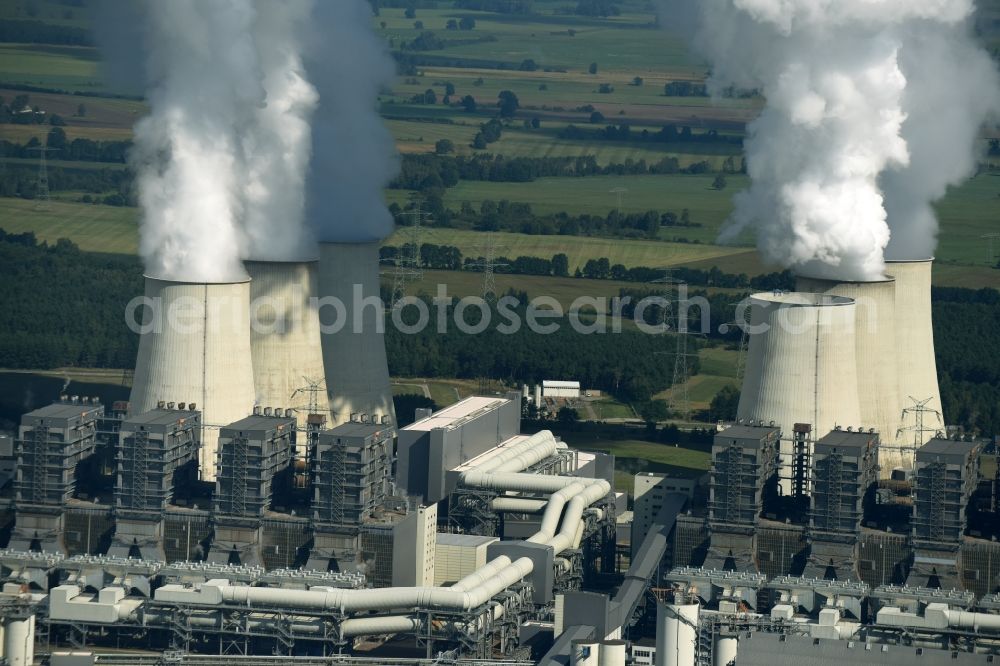 Aerial image Jänschwalde - Clouds of exhaust gas in the cooling towers of the power plant Jaenschwalde, a lignite-fired thermal power plant in southeastern Brandenburg. Power plant operator is to Vattenfall Europe belonging Vattenfall Europe Generation AG, which emerged from VEAG