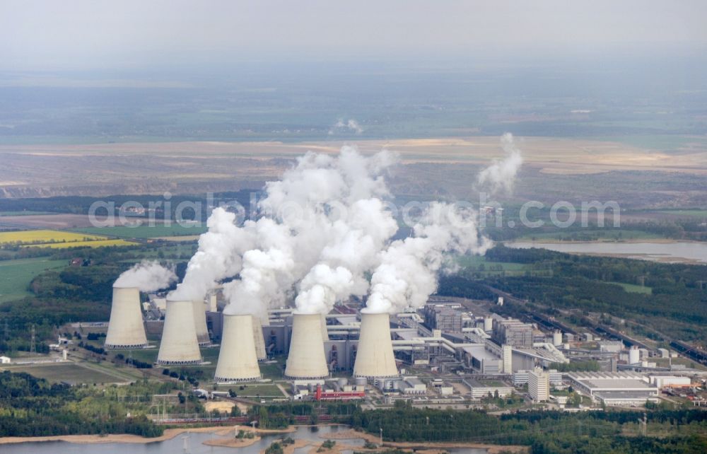 Aerial photograph Teichland - Clouds of exhaust gas in the cooling towers of the power plant Jaenschwalde, a lignite-fired thermal power plant in southeastern Brandenburg. Power plant operator is to Vattenfall Europe belonging Vattenfall Europe Generation AG, which emerged from VEAG