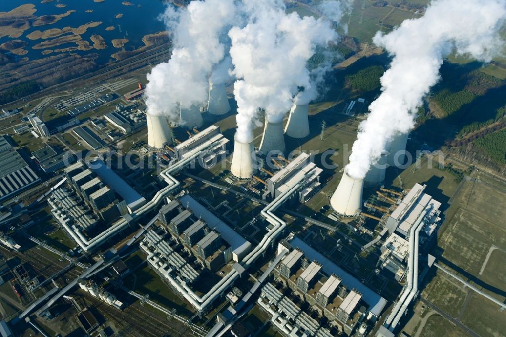 Teichland from above - Clouds of exhaust gas in the cooling towers of the power plant Jaenschwalde, a lignite-fired thermal power plant in southeastern Brandenburg. Power plant operator is to Vattenfall Europe belonging Vattenfall Europe Generation AG, which emerged from VEAG